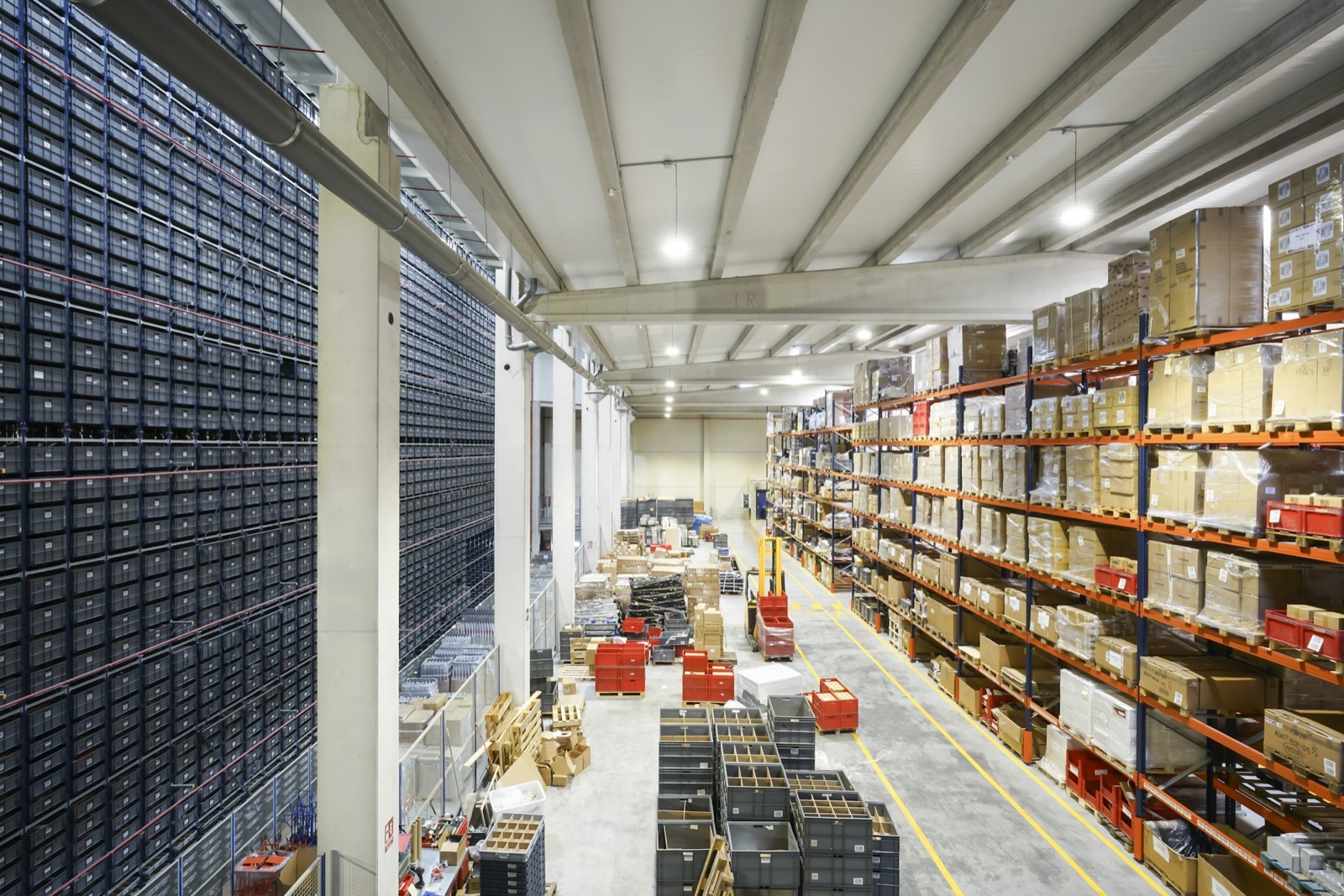 Warehouse aisle with packed cartons on pallet racking